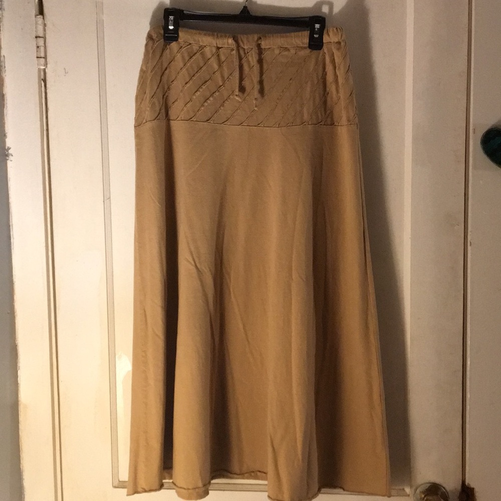 Long, beige skirt